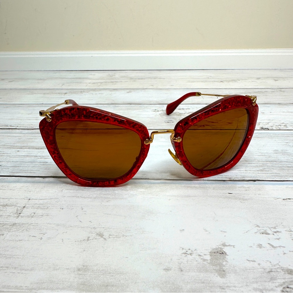 Miu Miu red glitter cat eye shaped sunglasses, gold hardware